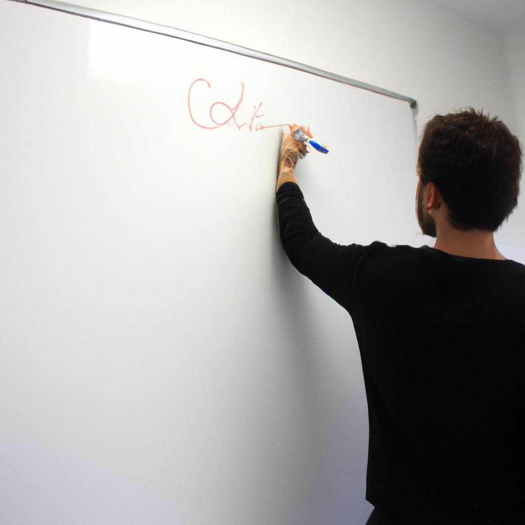 Person writing on whiteboard